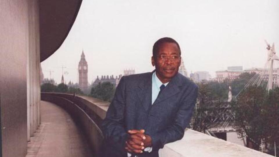 Len Garrison posing to the camera in central London with Big Ben in the background.